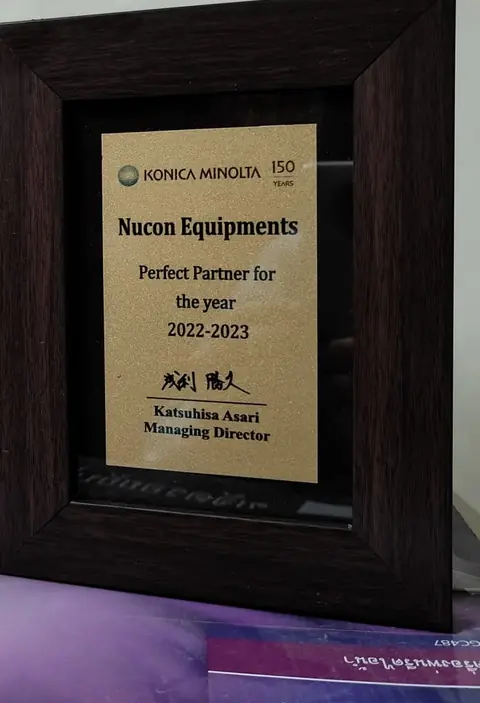 Konica Minolta Perfect Partner for the year 2022-2023 plaque awarded to Nucon Equipments