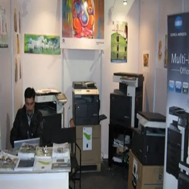 Nucon Equipments team with Konica Minolta machines at an exhibition stall